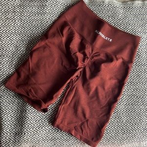 Alphalete Amplify Biker Shorts in Copper